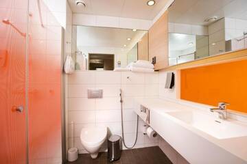Фото номера Двухместный номер с 2 отдельными кроватями Отель Original Sokos Hotel Vaakuna Joensuu г. Йоэнсуу 13