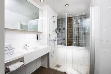 Фото номера Двухместный номер с 2 отдельными кроватями Отель Original Sokos Hotel Vaakuna Joensuu г. Йоэнсуу 4