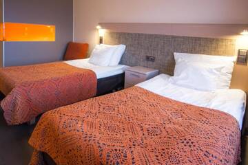 Фото номера Двухместный номер с 2 отдельными кроватями Отель Original Sokos Hotel Vaakuna Joensuu г. Йоэнсуу 6