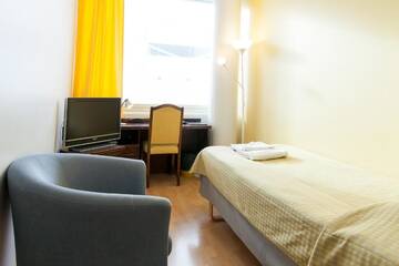 Фото номера Стандартный одноместный номер Отель Hotel Aada г. Йоэнсуу 6