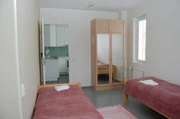 Фото номера Одноместный номер с общей ванной комнатой Хостелы Finnhostel Joensuu г. Йоэнсуу 4