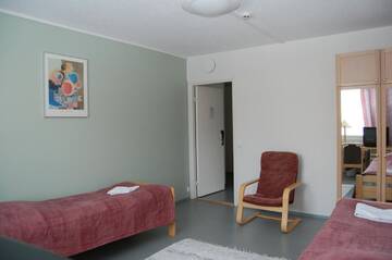Фото номера Одноместный номер с общей ванной комнатой Хостелы Finnhostel Joensuu г. Йоэнсуу 3