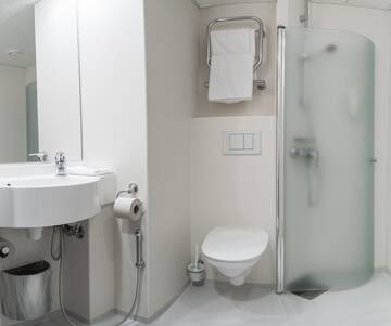Фото номера Стандартный трехместный номер Отель GreenStar Hotel Joensuu г. Йоэнсуу 4